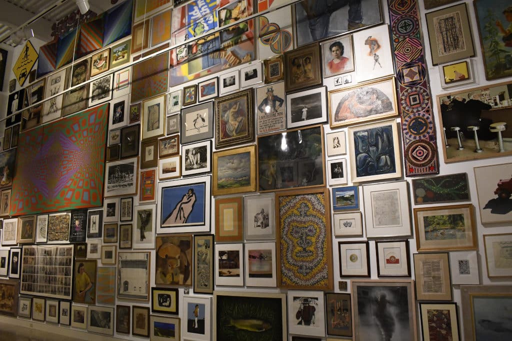 Wall of art at the Erie Art Museum